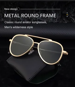 Detail of aviator sunglasses with gold frames and dark lenses on a black leather case