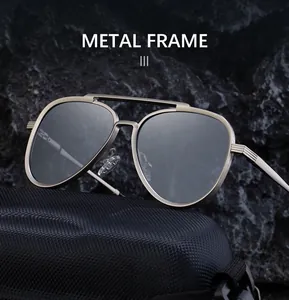 Close-up of metal frame sunglasses with gray lenses on a black textured storage case
