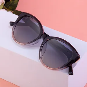 Fashion cat-eye polarized sunglasses with black to purple gradient frames and grey lenses
