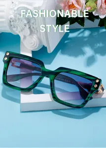Detail view of oversized green marble sunglasses with blue gradient lenses and CE mark