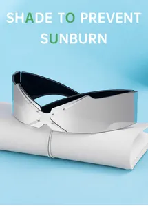 Détail de lunettes de soleil argentées avec pont en X unique et décorations de rivets fins