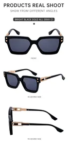 Three perspectives of oversized black sunglasses with gold rivets and grey lenses