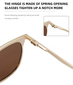 Vue détaillée de la charnière à ressort flexible sur les lunettes de soleil en métal doré