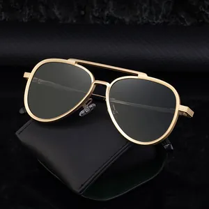 Classic gold aviator sunglasses for men with black lenses on a luxury leather case
