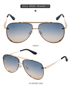 Detail view of gold aviator sunglasses with gradient orange lenses and metal frame