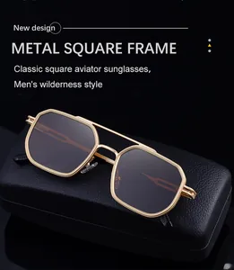 Detail of gold metal aviator sunglasses for men with a black leather texture glasses case