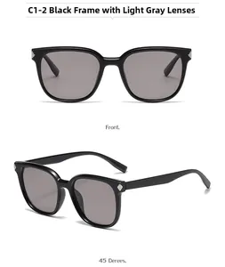 Vue détaillée de lunettes de soleil carrées noires avec verres gris et détails en métal