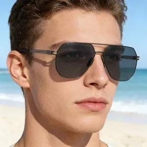 Detail of square polarized nylon lenses and gunmetal double bridge frame on male model