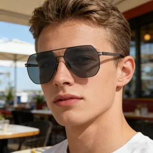 Close-up of modern square polarized sunglasses with double bridge metal frame on male model