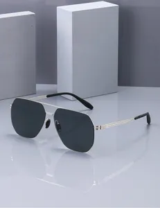 Detail of silver double bridge metal sunglasses with dark polarized nylon lenses