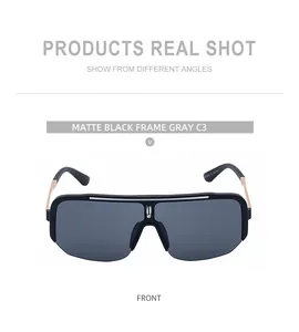 Detail of matte black semi-rimless sports sunglasses with golden metal hinge accents