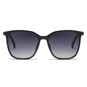 Fashionable oversized square sunglasses for women with black frames and purple gradient lenses