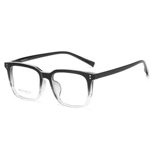Detail of square gradient black to clear optical frames with silver double rivets