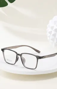 Detail of grey translucent square frame glasses with model AT68600 53-17-150 and C2 label