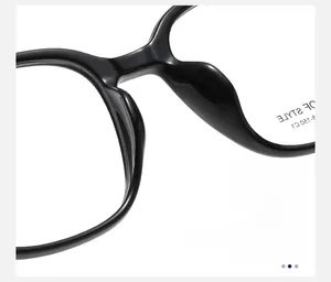 Detail of the integrated nose pads on black square optical glasses for skin comfort
