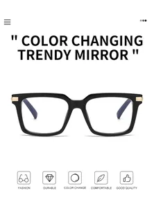 Detail of square black frame sunglasses with gold temple accents and photochromic lenses