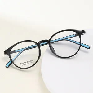 Montura de gafas redonda negra clásica con interior azul claro para mujer moda