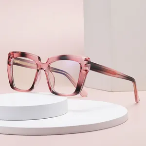 Occhiali anti-luce blu cat-eye con montatura sfumata rosa e stanghette con texture