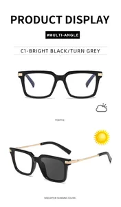 Detail of square black photochromic sunglasses changing from clear to grey lenses