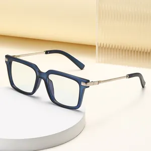 Modern square dark blue translucent frame glasses with silver metal temples on display