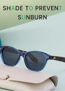 Blue cat eye polarized sunglasses with tortoiseshell temples and beige leather case