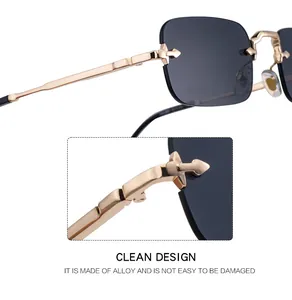 Detalle de las varillas de metal dorado con diseño de flecha en gafas sin montura