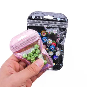 Holographic laser bags featuring green crystal beads and colorful petal DIY jewelry charms