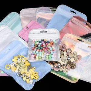 Close-up of holographic laser resealable bags with metallic finish for jewelry packaging