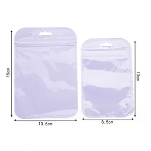 Detail showing two sizes of holographic light purple resealable jewelry packaging bags