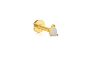 Close-up of teardrop opal labret stud with golden flat back and three-prong setting
