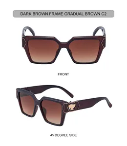 Dunkelbraune quadratische Sonnenbrille mit braunem Verlauf und goldener Metallverzierung