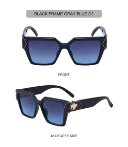 Detail der quadratischen schwarzen Sonnenbrille mit blauem Verlauf und Goldmetall-Akzenten