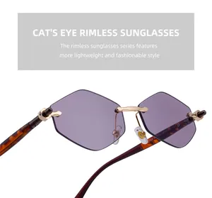 Detail of purple rimless cat-eye sunglasses with golden hinges and tortoiseshell temples