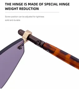 Detail of metal hinge on rimless sunglasses with purple lens and amber temples