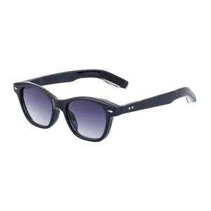 Classic black cat-eye sunglasses with purple gradient lenses and silver rivet accents