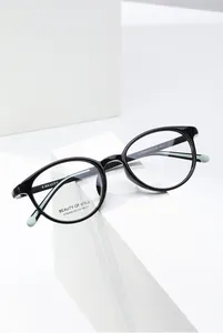 Detailed view of black oval full-rim glasses frame with model KT62606 and spec markings