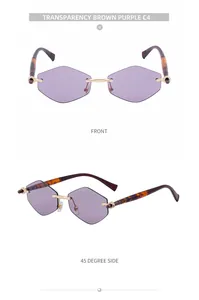 Detail view of purple rimless hexagonal sunglasses with gold metal bridge and tortoise arms