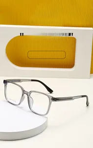 Macro detail of J10001 square eyeglasses showing size specs on transparent gray frame