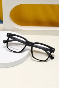Close-up of black square optical glasses with classic rivets and size details J10003