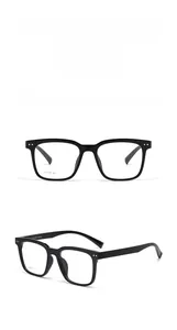 Close-up of black square optical glasses showing frame dimensions and temple engraving