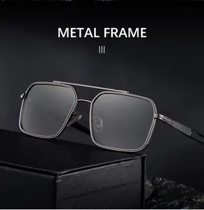 Detail of gunmetal double bridge square frame sunglasses with textured top bar