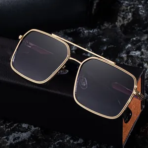 Men's square double bridge sunglasses with gold metal frame and dark lenses