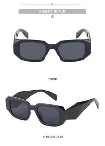 Détail de lunettes de soleil carrées noir brillant avec branches larges et coupe géométrique