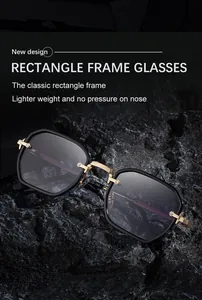 Detail of square frame sunglasses with gold metal hinges on dark stone background