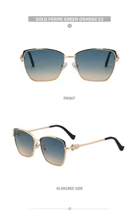 Vue de face et de profil de lunettes de soleil œil de chat dorées à verres dégradés
