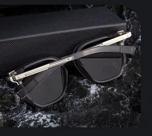 Detail showing high-quality zinc alloy golden temples and polygon frame of the sunglasses