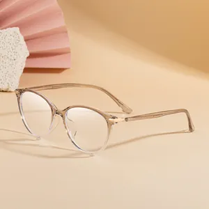 Detailed side view of stylish champagne transparent TR90 cat-eye glasses with gold hinges