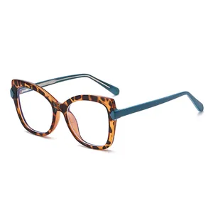 Stylish cat-eye leopard print glasses frame with blue temples on white background