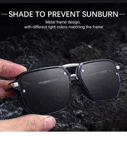 Detail of square sunglasses with blue frame, double metal bridge and dark lenses