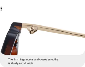 Macro detail of the sturdy golden metal hinge on square tortoise shell sunglasses